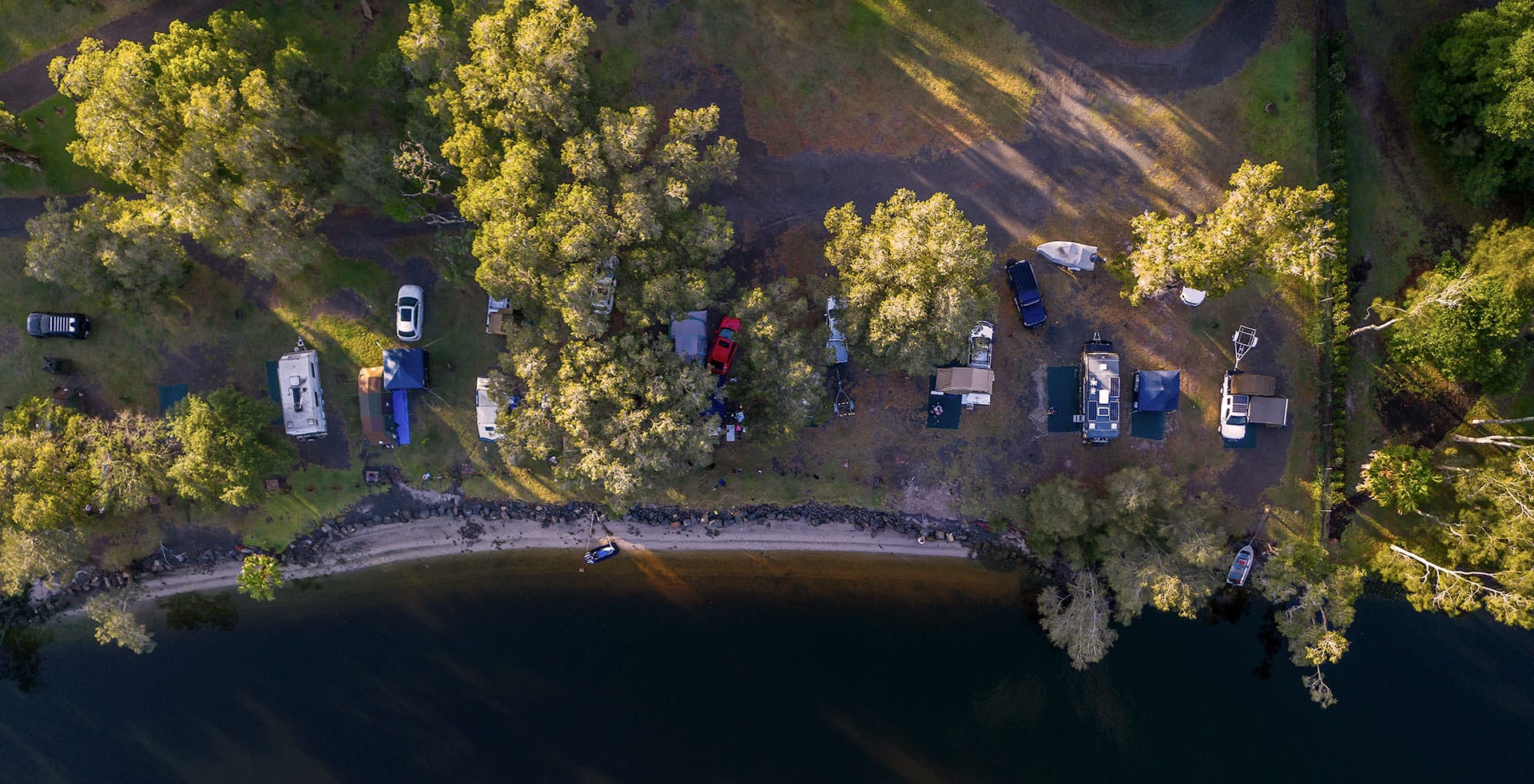 Myall River Camp | Connect with Nature, Hawks Nest, NSW Mid North Coast, glamping tents, tiny houses, campsites, aerial view riverfront campsites